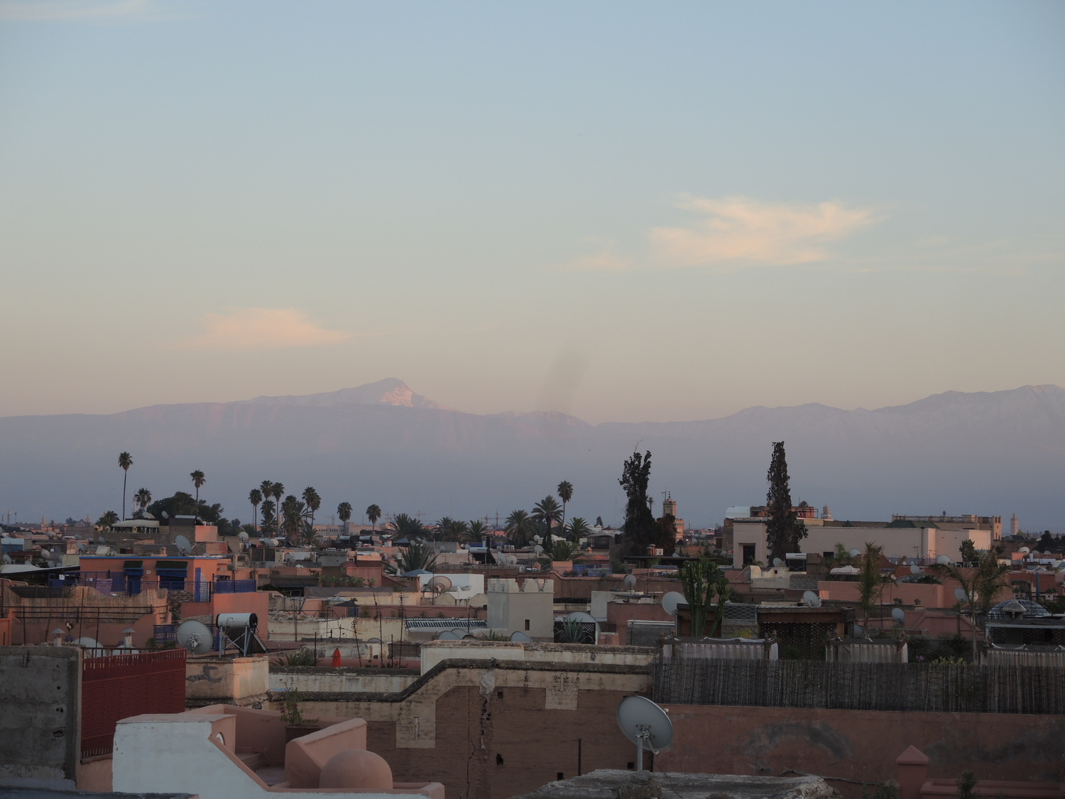 evening in Marakech with a view to the Atlas Mountains