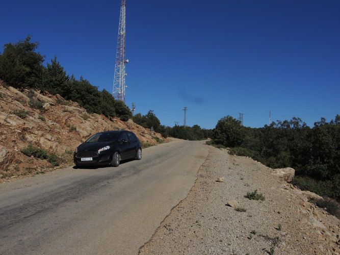 Our rental car and Moroccan roads in the Atlas Mountains